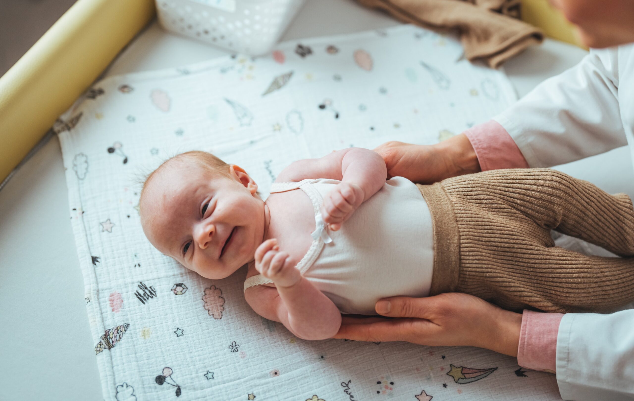 a mother taking care of a baby