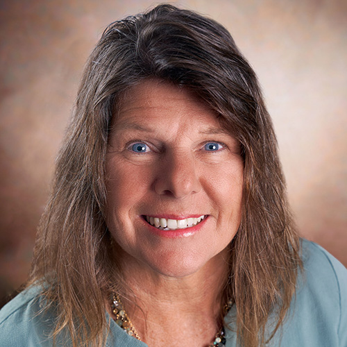 A photo of Kim, a CVHHH volunteer