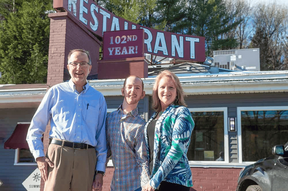 a family outside of a restaurant