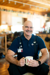 Matt volunteering with CVHHH, helping patients and families in Central Vermont